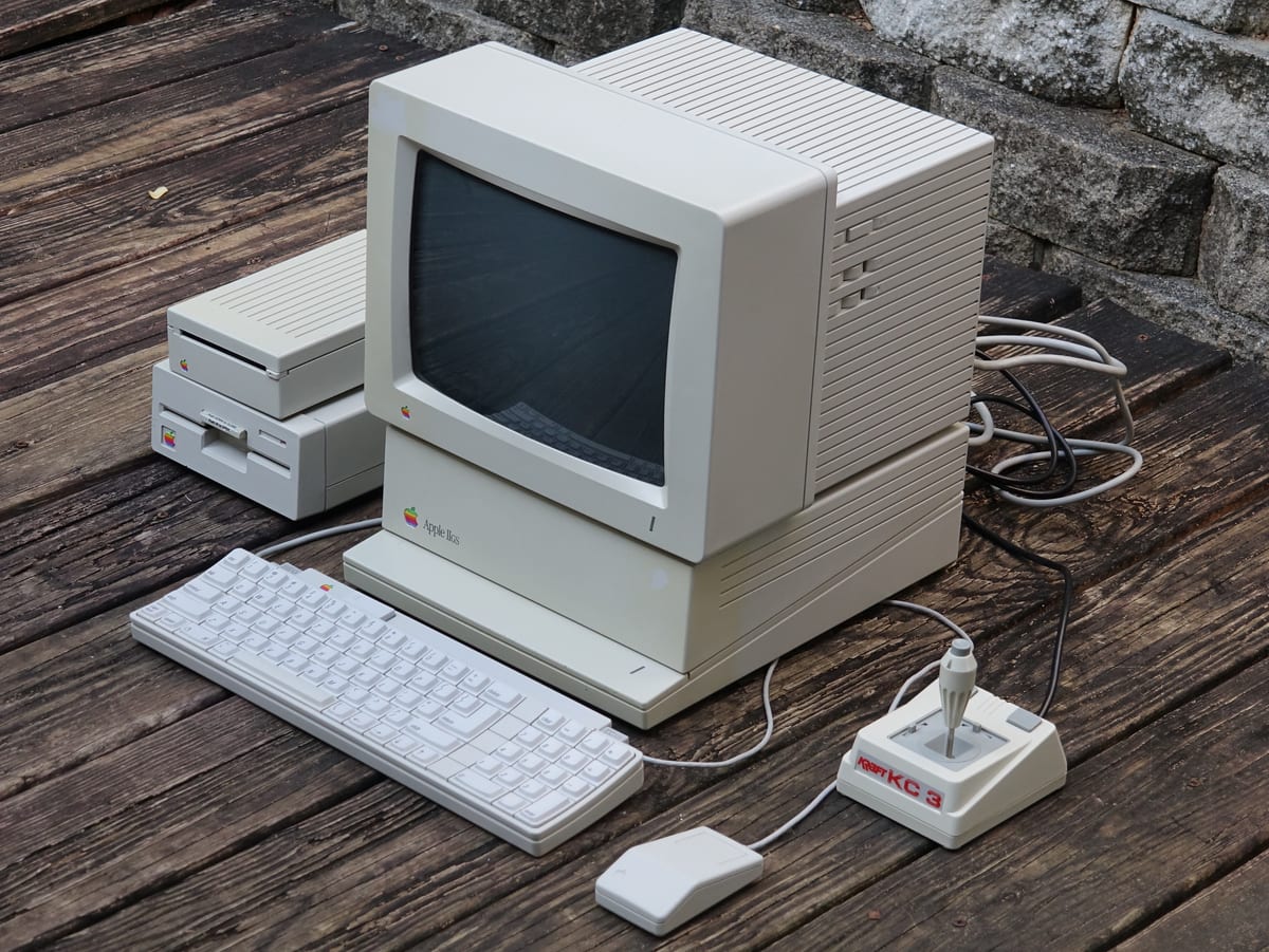 An Apple IIGS with keyboard, mouse, joystick, and external floppy drives